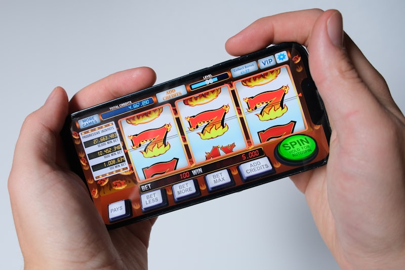 Layar ponsel menampilkan permainan slot sebagai ilustrasi bonus deposit slot Nasa4d